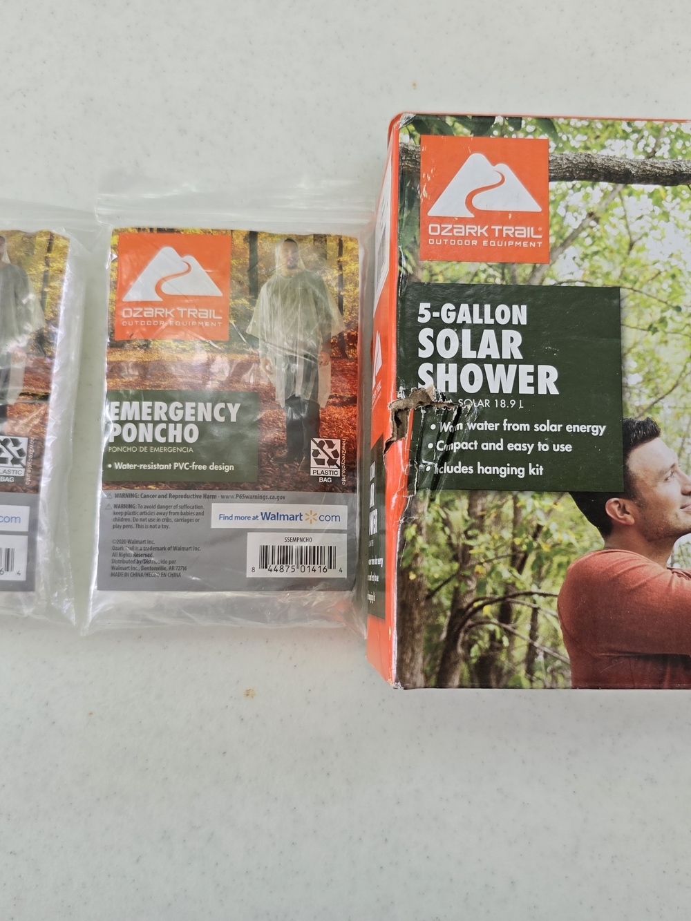 Ozark Trail  5-Gallon Solar Shower And 2 Emergency Poncho